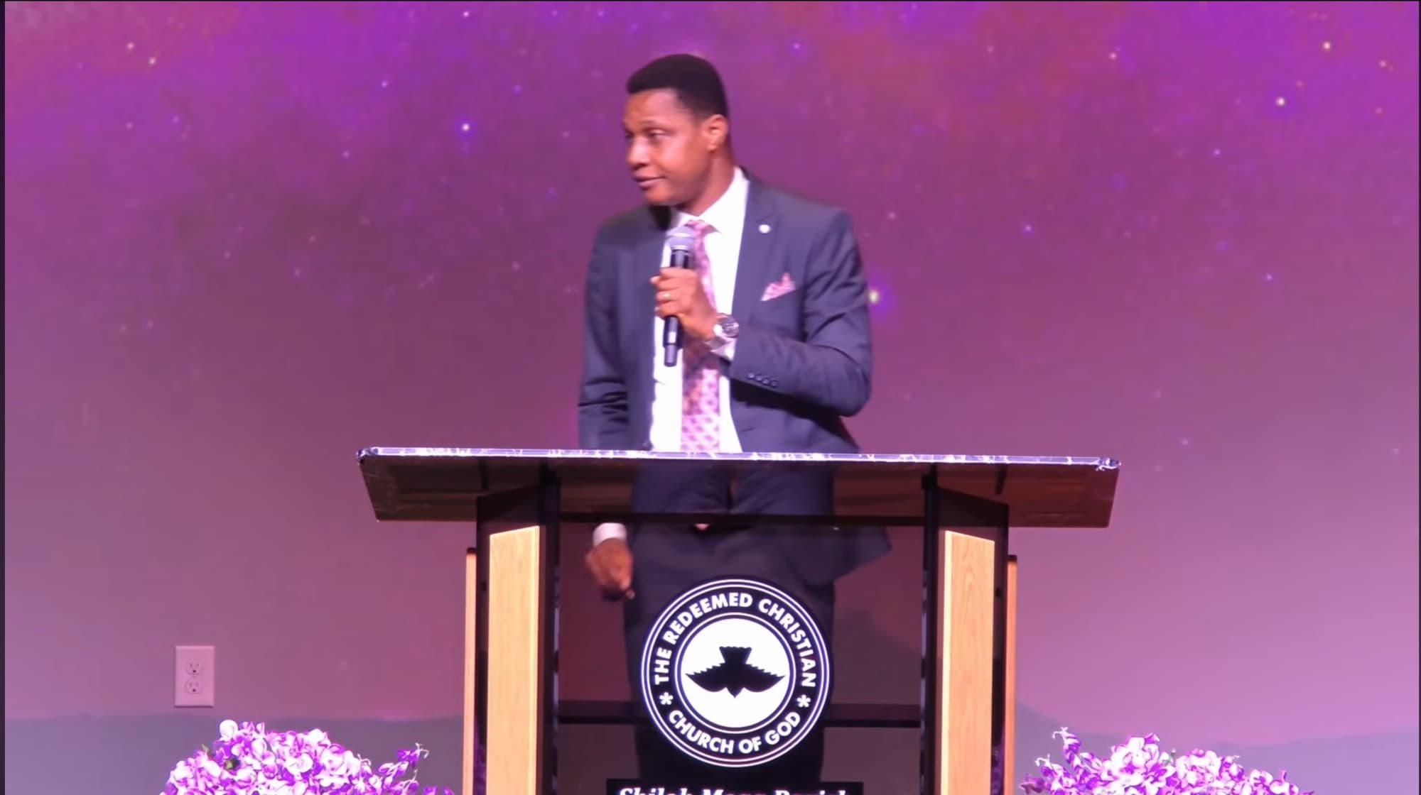 Youth Pastor Ogah preaching The Rain Makers at Shiloh Mega Parish